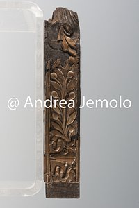 Archaeological Deposit Tripod leg with twig of laurel, bucranium, wood and ivory, from the Villa dei Papiri | Andrea Jemolo