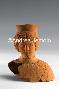 Archaeological Deposit Female bust with high headdress from sanctuary of Privati, votive stips - terracotta | Andrea Jemolo