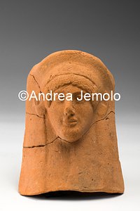 Archaeological Deposit Female bust with headdress from sanctuary of Privati, votive stips - terracotta | Andrea Jemolo