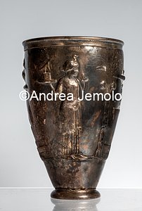 Archaeological National museum Glass with Isis that carries a statuette of the God-Hawk Sokaris towards an altar, silver, from Pompeii | Andrea Jemolo
