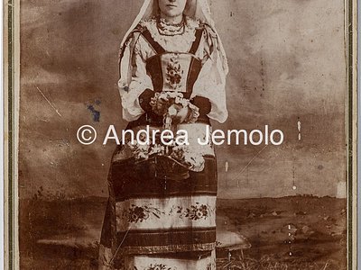  Portrait of a young Tuscan woman photographed wearing traditional festive attire. | Andrea Jemolo