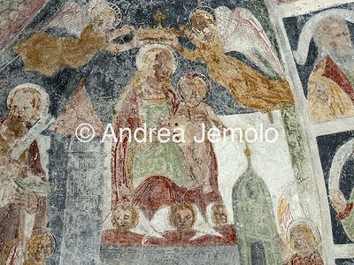 Reformed Church of Fex-Crasta Two angels carry the house of Mary to Loreto, two others lay a crown on the head of the Madonna - fresco | Andrea Jemolo