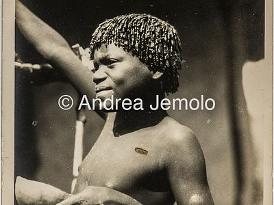 Transafrican expedition Baragiola-Durini Boy from an African tribe in a village | Andrea Jemolo