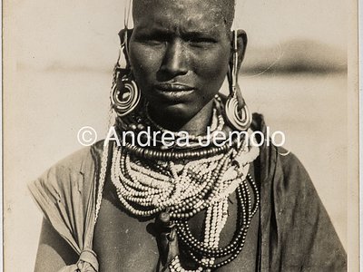 Transafrican expedition Baragiola-Durini Portrait of a woman from the tribe of Turkana. The woman has a hairstyle of pigtails and wears a characteristic beaded collar | Andrea Jemolo