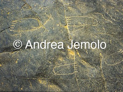 Graffiti, Dider, rock carvings with human footprints, Iherir oasis, Tassili n’Ajjer, Tadart Rouge | Andrea Jemolo