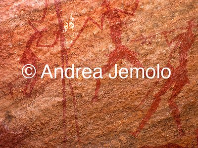  Rock painting depicting warriors armed with spears, Tassili n’Ajjer, Tadart Rouge - Period of the horse | Andrea Jemolo