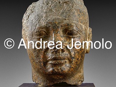 Egyptian museum Head of Taharka King in red granite | Andrea Jemolo