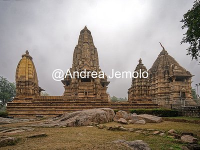 Temples Kandariya Mahadeva, Mahadeva, Devi Jagadami seen from west with archaeological finds Temples Kandariya Mahadeva, Mahadeva, Devi Jagadami seen from west | Andrea Jemolo