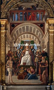 Basilica di Santa Maria Gloriosa dei Frari Altarpiece depicting Saint Ambrose on the throne between musical angels and eight saints | Andrea Jemolo