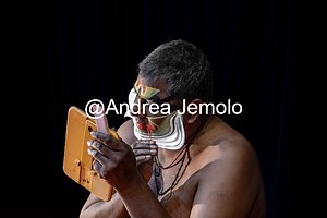 Kathakali Kathakali - A dancer from Kathakali, puts on his face before a show | Andrea Jemolo
