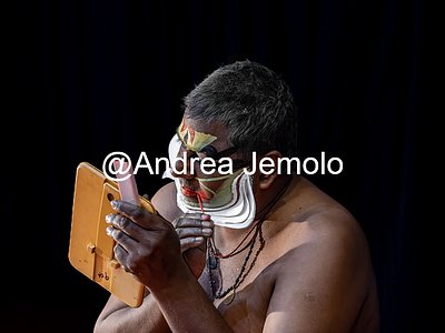 Kathakali Kathakali - A dancer from Kathakali, puts on his face before a show | Andrea Jemolo