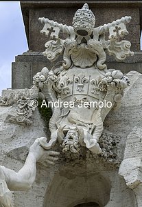 Fountain of the Four Rivers Marble coat of arms of the pope's family of Innocent X Pamphilj supported by the statue of the Danube | Andrea Jemolo