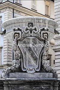 Fountain in Piazza Santa Maria in Trastevere Coat of arms with inscription inserted in a restoration of 1873 | Andrea Jemolo