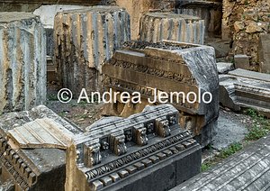 Temple of the Nymphs Eastern portico of the temple. Four bases of Republican age columns and travertine slabs are visible | Andrea Jemolo