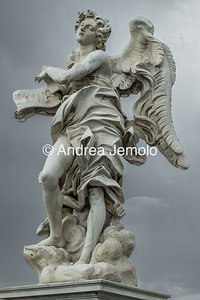 Ponte Sant'Angelo and the ten statues depicting Angels carrying the instruments of the Passion Angel with the title INRI copy from the statue sculpted by Bernini | Andrea Jemolo