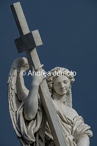 Ponte Sant'Angelo and the ten statues depicting Angels carrying the instruments of the Passion Angel with the Cross | Andrea Jemolo