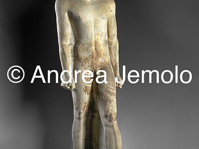 Egyptian museum Statue of a naked man, painted Limestone, Saqqara | Andrea Jemolo