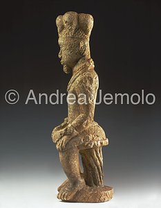 Esiẹ Museum Figure seatting with sword - Esie | Andrea Jemolo
