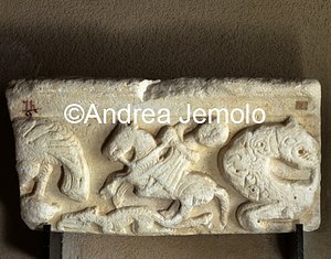Pepoli museum Lintel with knight pursuing a dragon | Andrea Jemolo